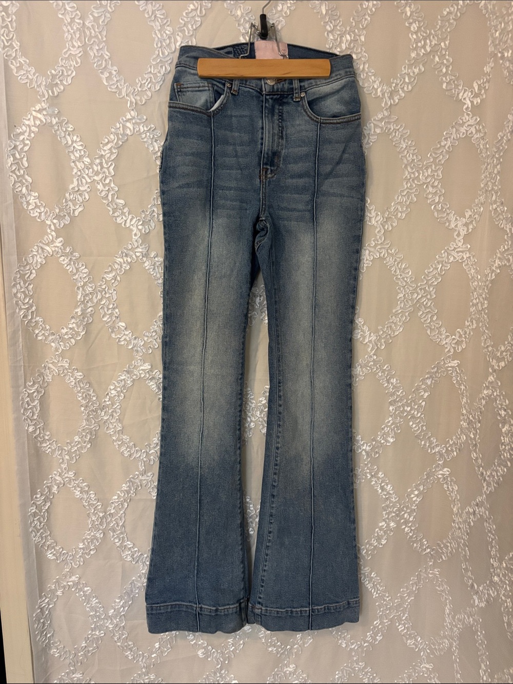 REVICE High-Rise Flare Jeans in Faded Blue Wash
